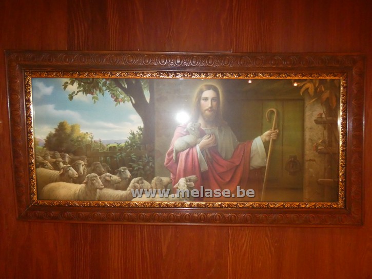 Religieuze prent achter glas in kader